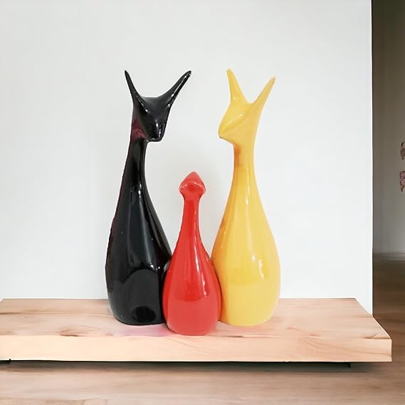 Black, yellow, red deer family showpieces